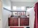 A bathroom features a double vanity, decorative mirrors, and a coordinated tile scheme at 1719 North W Blvd, Davenport, FL 33837
