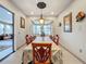 Formal dining room with a large table and decorative accents at 1719 North W Blvd, Davenport, FL 33837
