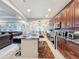 Bright kitchen boasts a large island and stainless steel appliances at 1719 North W Blvd, Davenport, FL 33837