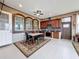 Cozy kitchen and breakfast nook with granite countertops and modern appliances at 1719 North W Blvd, Davenport, FL 33837