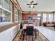 Bright kitchen and dining area with a marble table and access to an outdoor space at 1719 North W Blvd, Davenport, FL 33837