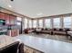Sun-drenched kitchen and dining area with ample cabinet space and modern appliances at 1719 North W Blvd, Davenport, FL 33837