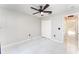 Bright bedroom with tile floors and double door closet at 2463 Hybrid Dr, Kissimmee, FL 34758