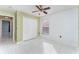 Bright bedroom with tile floors and double door closet at 2463 Hybrid Dr, Kissimmee, FL 34758