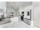 Updated kitchen featuring granite countertops and white cabinetry at 2463 Hybrid Dr, Kissimmee, FL 34758