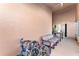 Covered patio with seating and bicycles at 2463 Hybrid Dr, Kissimmee, FL 34758