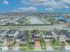 Aerial view of a house and surrounding neighborhood at 2516 Nouveau Way, Kissimmee, FL 34741