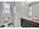 Clean bathroom with shower and vanity at 2516 Nouveau Way, Kissimmee, FL 34741