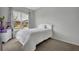 Bright bedroom with a double bed and large window at 2516 Nouveau Way, Kissimmee, FL 34741