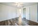 Bright bedroom with wood-look floors and spacious closet at 277 Debary Dr, Debary, FL 32713