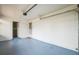 Attached garage with painted floor and extra storage at 277 Debary Dr, Debary, FL 32713