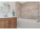 Bathroom with a walk-in shower and stylish tile at 2824 Oak Lea Dr, South Daytona, FL 32119