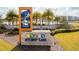 Story Lake community entrance sign with lake view at 3151 Paradox Cir # 107, Kissimmee, FL 34746