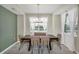 Modern dining room with lake view at 3151 Paradox Cir # 107, Kissimmee, FL 34746