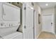 Stackable washer and dryer in a convenient laundry closet at 3151 Paradox Cir # 107, Kissimmee, FL 34746