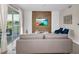 Living room with wood-look wall and comfy seating at 3151 Paradox Cir # 107, Kissimmee, FL 34746