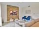 Modern living room with wood-look feature wall at 3151 Paradox Cir # 107, Kissimmee, FL 34746