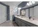 Modern bathroom with double vanity and a large walk-in shower at 4558 Lions Gate Ave, Clermont, FL 34711