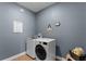 Convenient laundry room with washer and dryer at 4558 Lions Gate Ave, Clermont, FL 34711