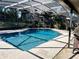 Inviting screened-in pool with plenty of space for relaxation at 506 Little Wekiva Rd, Altamonte Springs, FL 32714