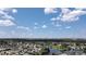 Aerial view of houses, a lake, and golf course at 5120 Adelaide Dr, Kissimmee, FL 34746