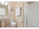 Bathroom with shower, toilet and sink at 5120 Adelaide Dr, Kissimmee, FL 34746