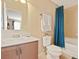 Bathroom with tub, shower, toilet and sink at 5120 Adelaide Dr, Kissimmee, FL 34746