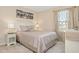 Bedroom with a queen bed and nightstands at 5120 Adelaide Dr, Kissimmee, FL 34746