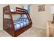 Bunk beds and a dresser in a cheerful bedroom at 5120 Adelaide Dr, Kissimmee, FL 34746