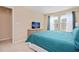 Bedroom with a king bed and dresser at 5120 Adelaide Dr, Kissimmee, FL 34746