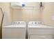 Laundry room with Whirlpool washer and dryer at 5120 Adelaide Dr, Kissimmee, FL 34746