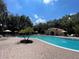 Relaxing kidney-shaped community pool at 5120 Adelaide Dr, Kissimmee, FL 34746