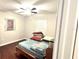 Bedroom with wood floors and ceiling fan at 513 Greenbrough Dr, Lake Wales, FL 33853