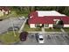 Aerial view of condo showing building and parking lot at 532 Hunter Cir, Kissimmee, FL 34758