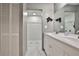 Clean bathroom with double vanity and marble floors at 532 Hunter Cir, Kissimmee, FL 34758