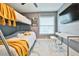 Bedroom with bunk beds, a desk, and a TV at 532 Hunter Cir, Kissimmee, FL 34758
