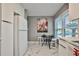 Kitchen with white cabinets and breakfast nook at 532 Hunter Cir, Kissimmee, FL 34758