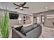 Living Room with gray couch and modern decor at 532 Hunter Cir, Kissimmee, FL 34758