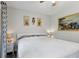 Bedroom with king-size bed, ceiling fan, and artwork on the wall at 701 Glasgow Ct # 701, Winter Springs, FL 32708