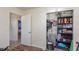 Well-organized closet with shelving and hanging rods at 716 Katherine St, South Daytona, FL 32119