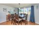 Dining room with a wooden table and six chairs at 716 Katherine St, South Daytona, FL 32119