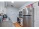 Modern kitchen with stainless steel appliances and wood flooring at 716 Katherine St, South Daytona, FL 32119