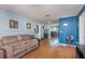 Living room featuring hardwood floors and comfortable seating at 716 Katherine St, South Daytona, FL 32119