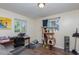 Bright office space with a desk, cat tree and plenty of natural light at 716 Katherine St, South Daytona, FL 32119