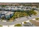 Community overview showcasing numerous homes and landscape at 7260 Oakmoss Loop, Davenport, FL 33837
