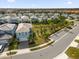 Aerial view of a house and surrounding community at 7260 Oakmoss Loop, Davenport, FL 33837