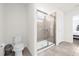 Bathroom with toilet and a large walk-in shower at 7260 Oakmoss Loop, Davenport, FL 33837