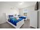bedroom with twin beds, and Toy Story themed bedding at 7260 Oakmoss Loop, Davenport, FL 33837