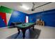 Game room with pool table and various games at 7260 Oakmoss Loop, Davenport, FL 33837