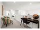 Loft area with desk and two chairs, overlooking lower level at 7260 Oakmoss Loop, Davenport, FL 33837